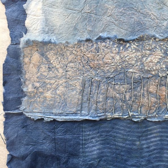 Eleanor Burkett, Detail of Unearthed I. Brushed pigments and katazome resist dye on handmade paper, stitched with paper thread.